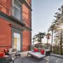 Superior Room Patio Seating Area at The Britannique Naples, Curio Collection by Hilton