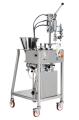 RIEMPITRICE-TAPPATRICE SEMIAUTOMATICA PER SACCHE DOYPACK