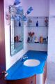 box doccia, lavabi e specchiere in vetro