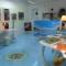 pavimento personalizzato in pvc lastre da 50x50c. con adesivo centrale