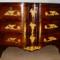 cassettone in ciliegio con cariatidi scolpite