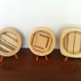 piatti in legno intarsiato