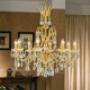 702/8- lampadario 8 luci in cristallo Sw e ottone dorato