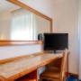 Guest room with three beds