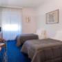 Guest room with three beds