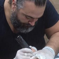 Re Artist Tattoo Studio