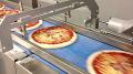 Confezionatrici termoretraibili per pizze e altri prodotti surgelati  velocità e multiformato.