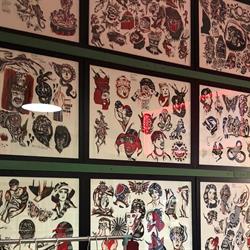 RISE ABOVE Tattoo shop