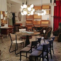 Milano Novecento antiquariato e immobiliare