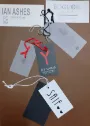 CARTELLINI ABBIGLIAMENTO CON LACCETTO CON EVENTUALE INSERIMENTO DI SPILLETTA CARTELLINO DI CORTESIA