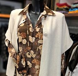 LE CHIC Porto Ceresio (VA) ITALY Access. moda, abbigliamento donna, tessuti e servizio sartoria.