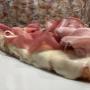 Pizza al trancio con salumi misti