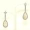 Orecchini in oro bianco 18kt, diamanti taglio brillante ct 0.65, pietra opale ct 3.80