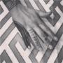 Black hand tattoo